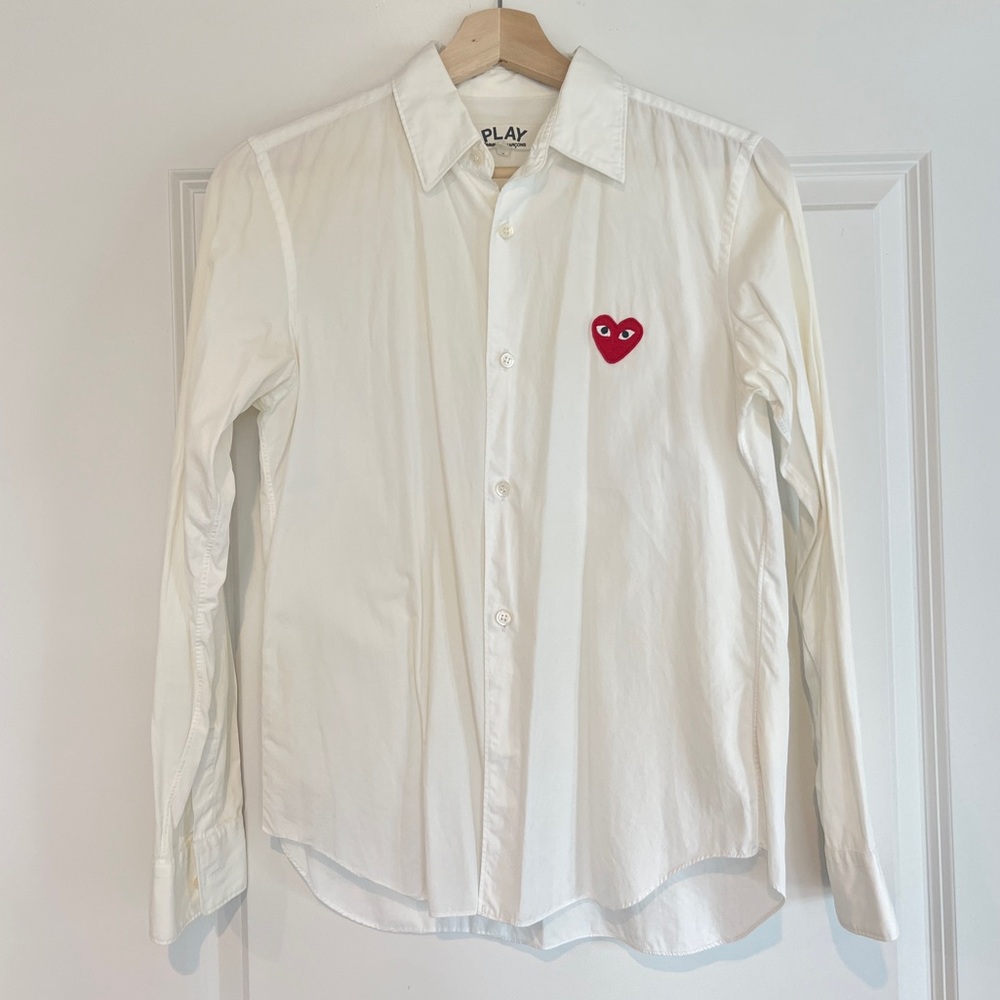 White Shirt with Red Heart Patch